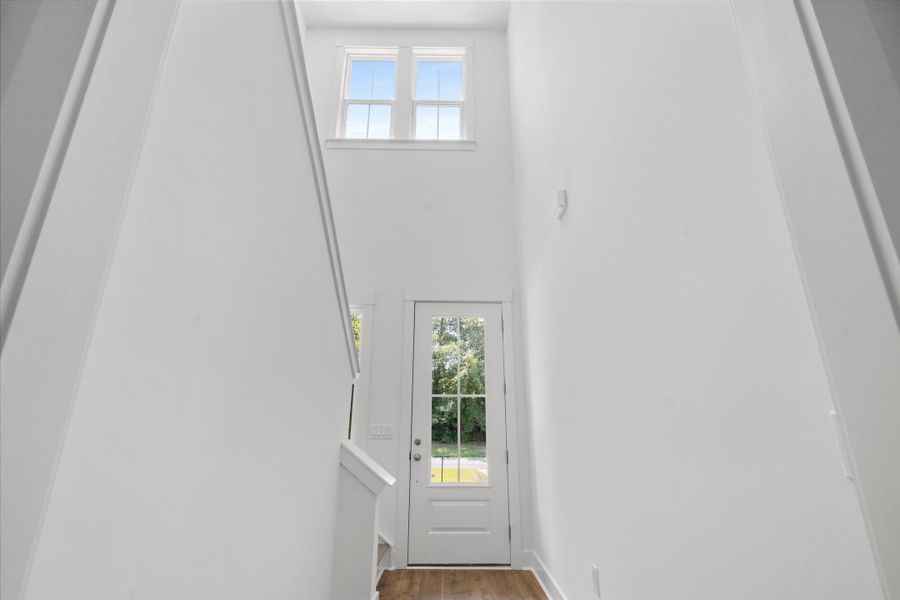 Spacious, unfurnished interior of a new home in Long Bay Golf Club, Longs (Image 34).