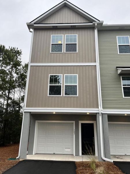 Front exterior of a new home in , Charleston, SC, highlighting curb appeal (Image 1). Front exterior of a new home in , Charleston, SC, highlighting curb appeal (Image 1).