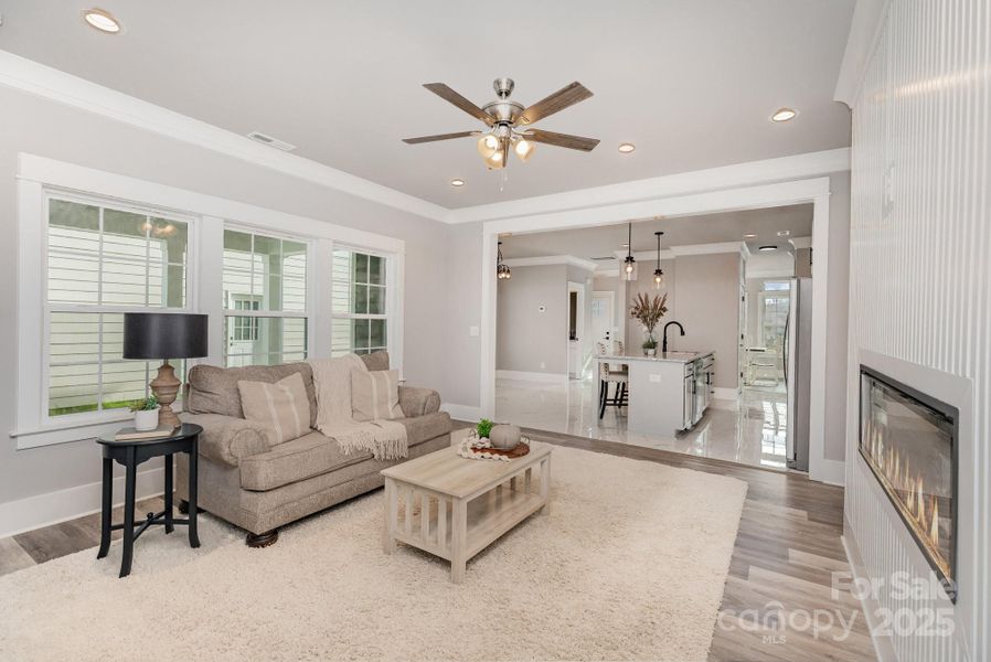 Open concept family room with electric fireplace