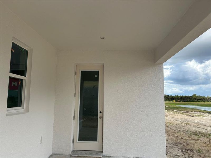 In-progress construction of a new home in Oakfield Trails Signature, Parrish, FL (Image 25).