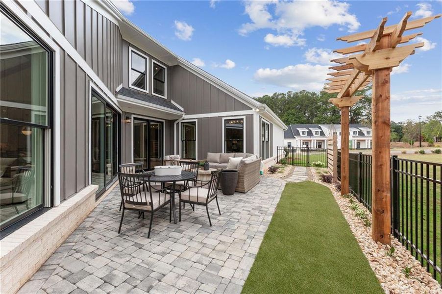 Exterior details and patio area of a home in The Courtyards by The Manor, Alpharetta (Image 32). Exterior details and patio area of a home in The Courtyards by The Manor, Alpharetta (Image 32).