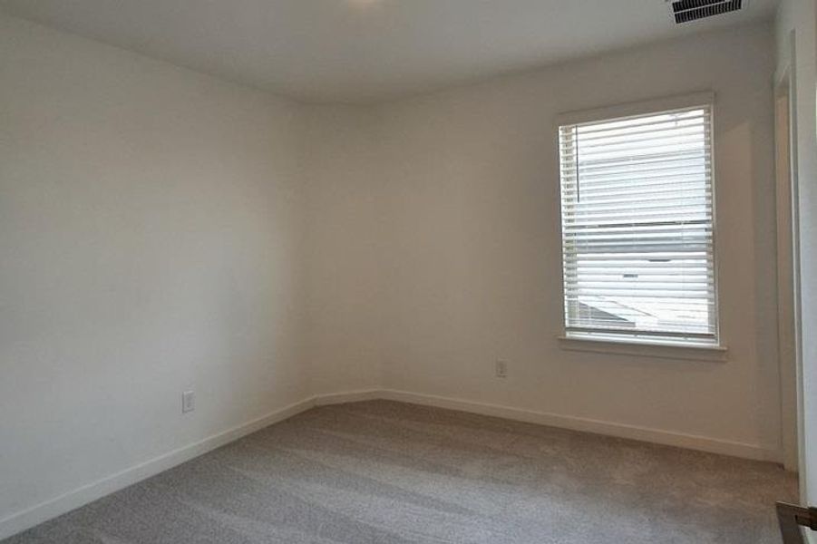 Spacious, unfurnished interior of a new home in Wolf Ranch, Georgetown (Image 22).