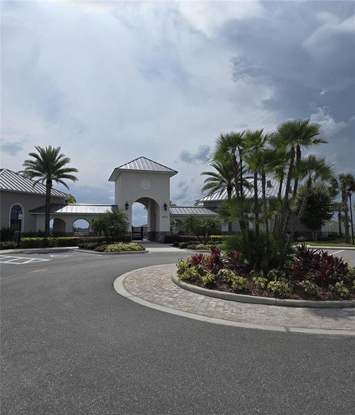 Front exterior of a new home in Isles of Lake Nona, Orlando, FL, highlighting curb appeal (Image 15).