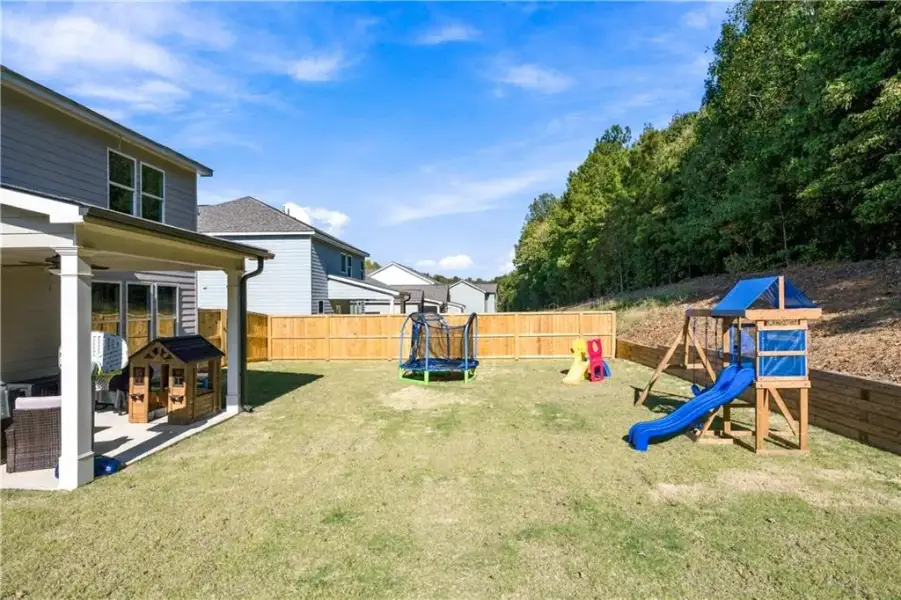 Exterior details and patio area of a home in Sutton’s Landing, Statham (Image 22).