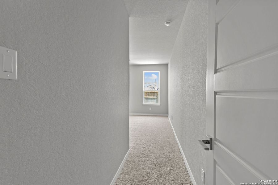 Spacious, unfurnished interior of a new home in The Reserve at Potranco Oaks, Castroville (Image 58).