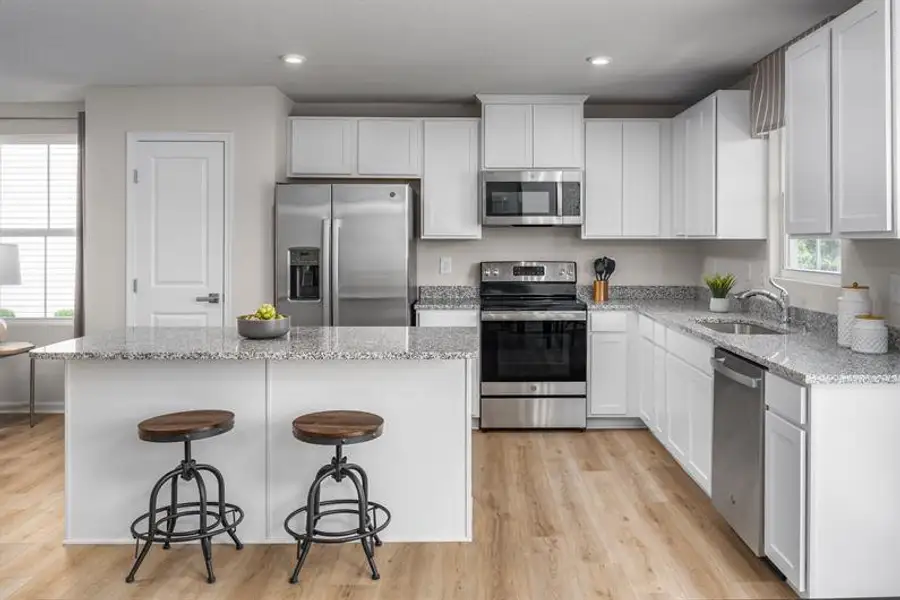 Representative furnished interior of a home built from the Tupelo by Ryan Homes in Williams Run, Bailey (Image 4).