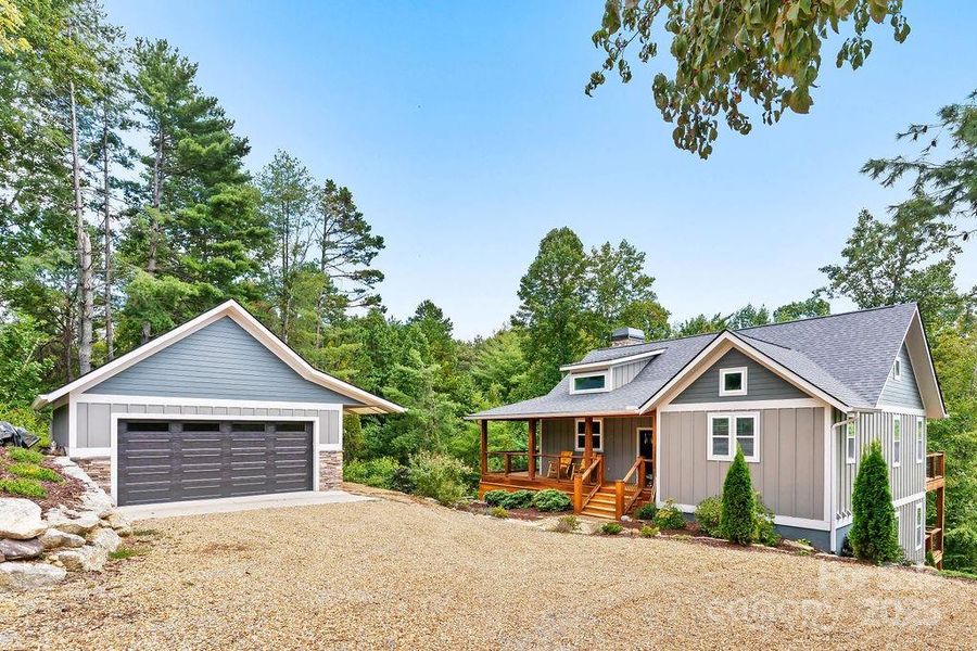 Front exterior of a new home in , Hendersonville, NC, highlighting curb appeal (Image 21).
