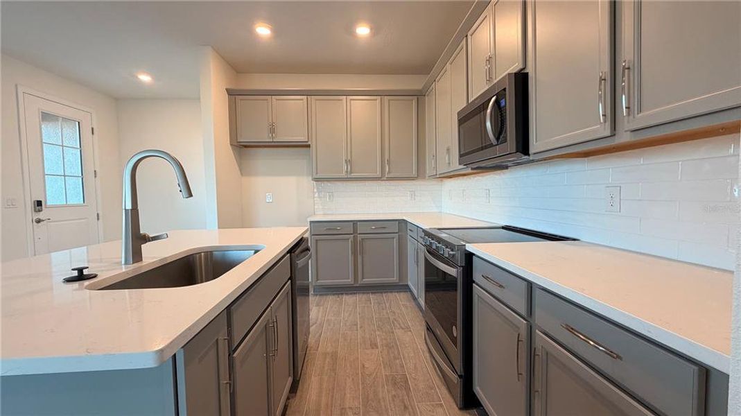 Furnished interior view inside a new home in Seaire, Parrish (Image 4).