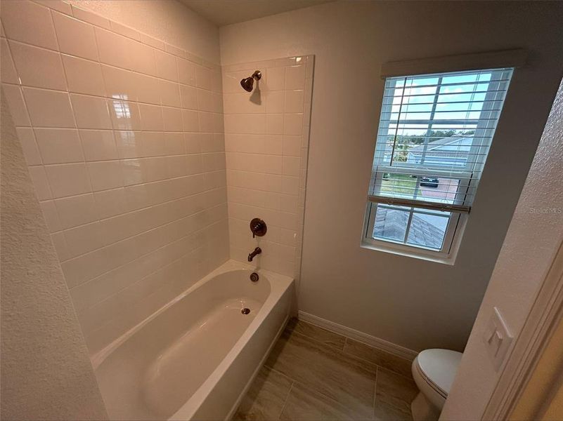 Furnished interior view inside a new home in Trinity Place, St. Cloud (Image 5).