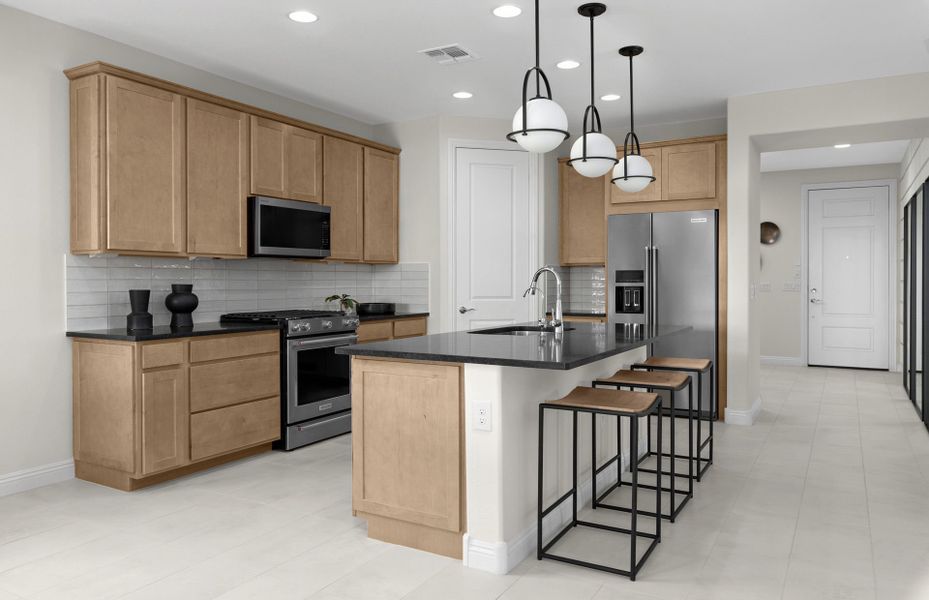 Representative furnished interior of a home built from the Hewitt by Pulte Homes in Strata, Dacono (Image 4).