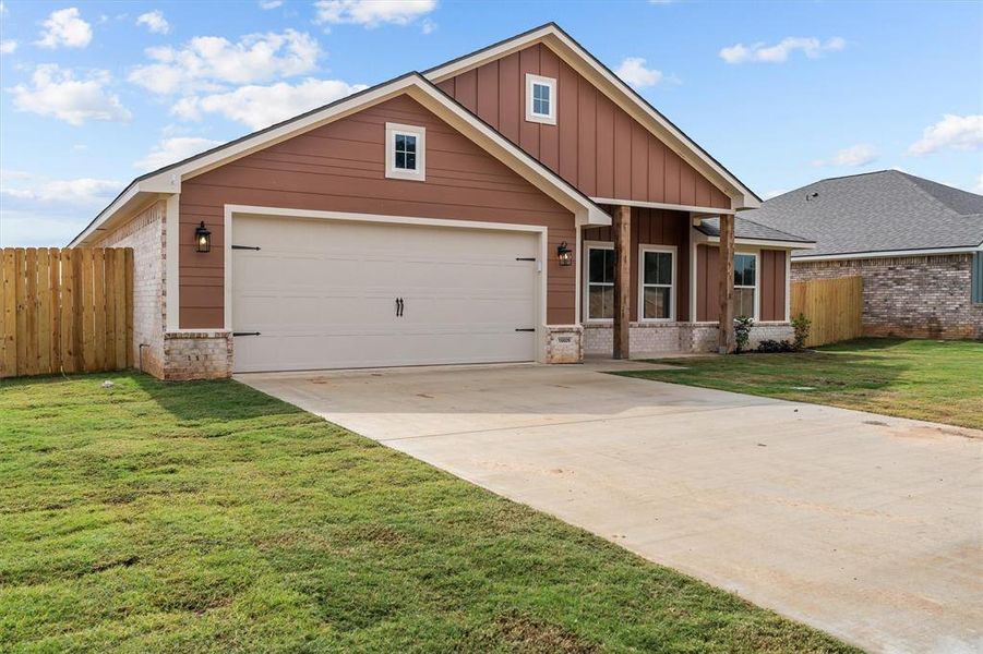 Front exterior of a new home in , Lindale, TX, highlighting curb appeal (Image 15).