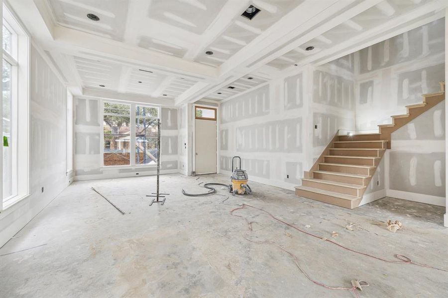 Stunning Staircase across from the Formal Dining Room and Formal Living Room.  Construction as of Jan. 13th, 2025.