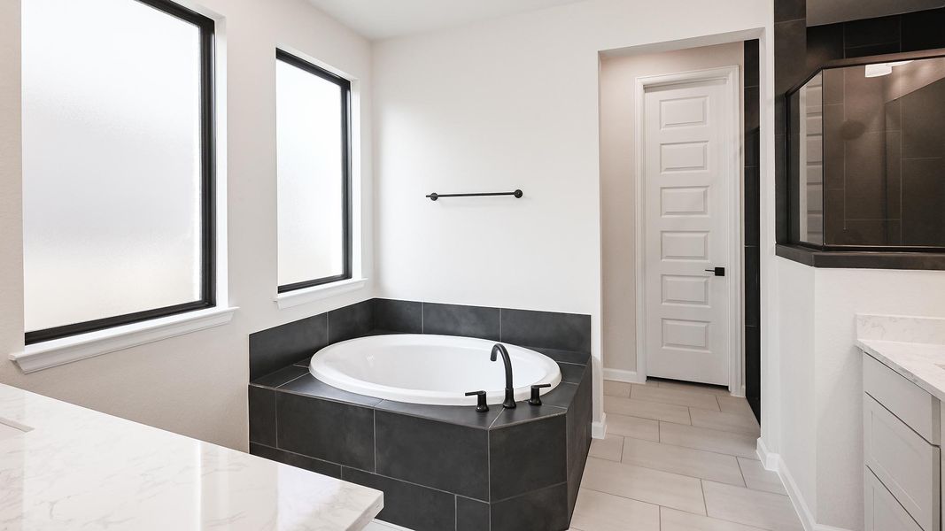 Furnished interior view inside a new home in 6 Creeks, Kyle (Image 10).