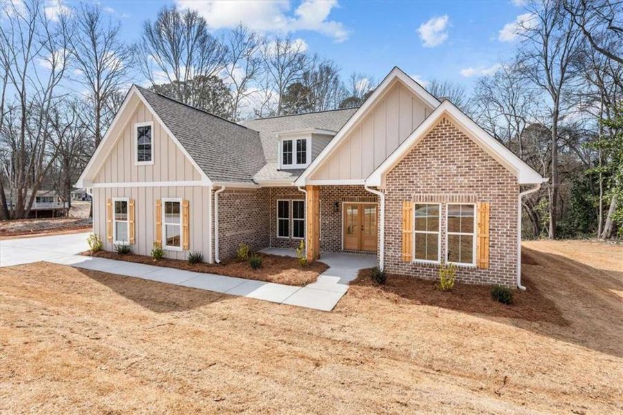Front exterior of a new home in , Temple, GA, highlighting curb appeal (Image 21).