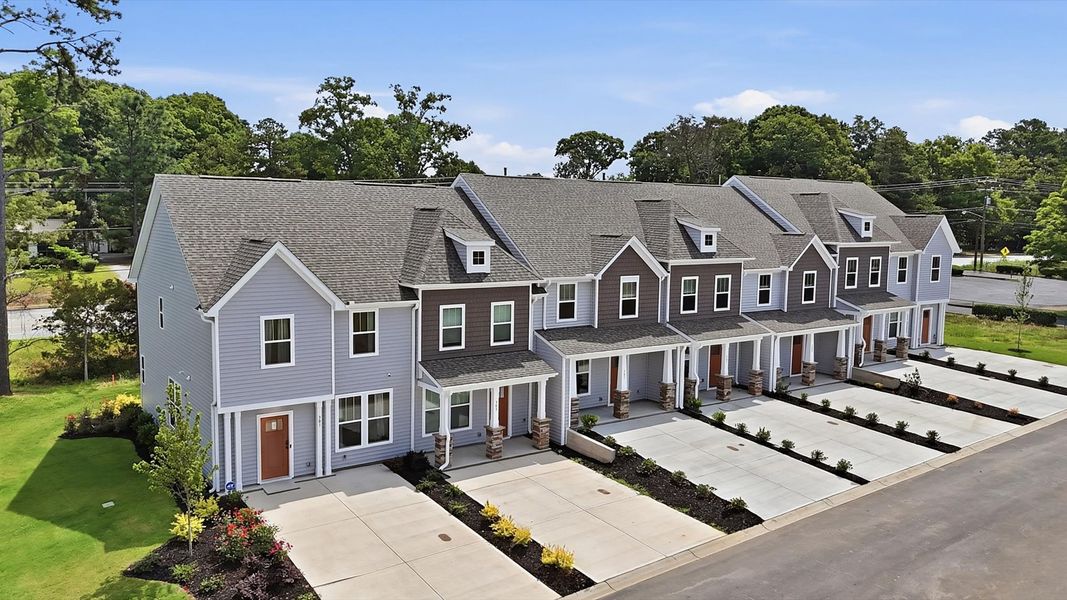 Front exterior of a new home in Clarke Townes, Anderson, SC, highlighting curb appeal (Image 22). Front exterior of a new home in Clarke Townes, Anderson, SC, highlighting curb appeal (Image 22).
