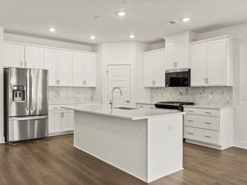 Furnished interior view inside a new home in The Coves at Lakes of Cane Bay, Summerville (Image 7).