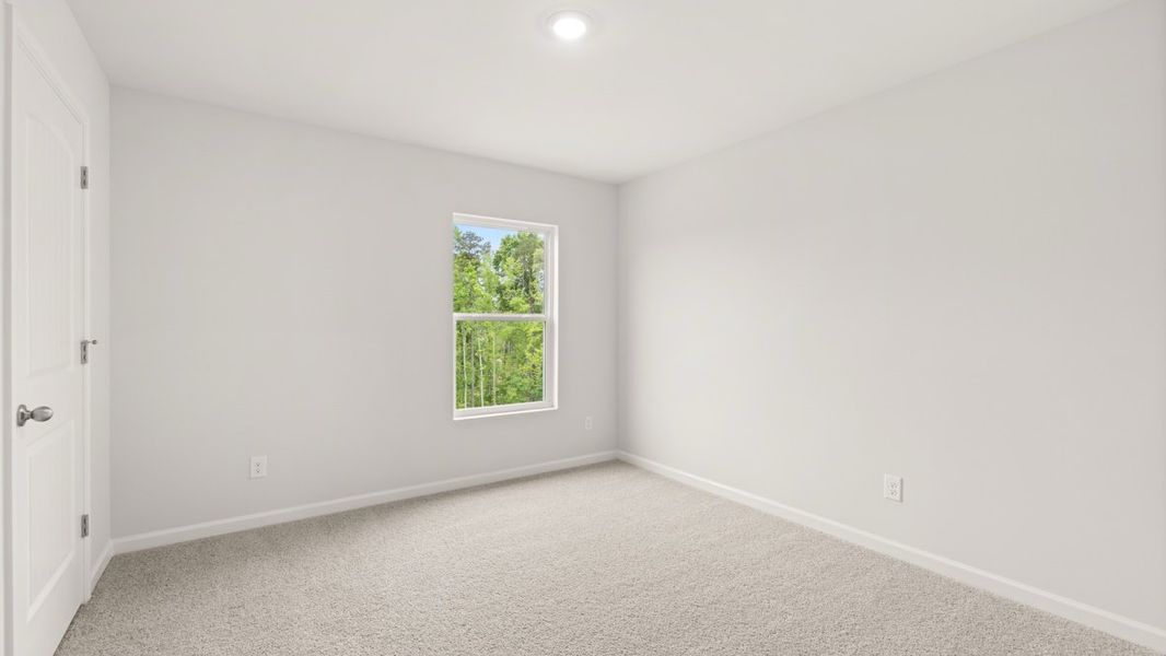 Representative unfurnished interior of a home built from the Flora by D.R. Horton in Sheffield Highlands, Dallas (Image 24).