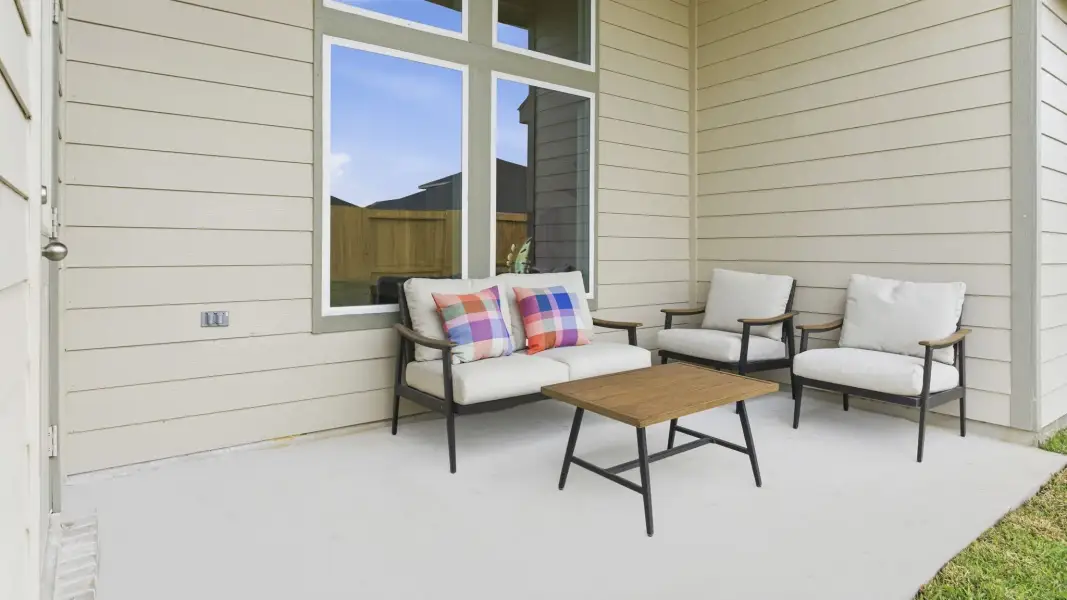 Exterior details and patio area of a home in August Trails, Needville (Image 2). Exterior details and patio area of a home in August Trails, Needville (Image 2).