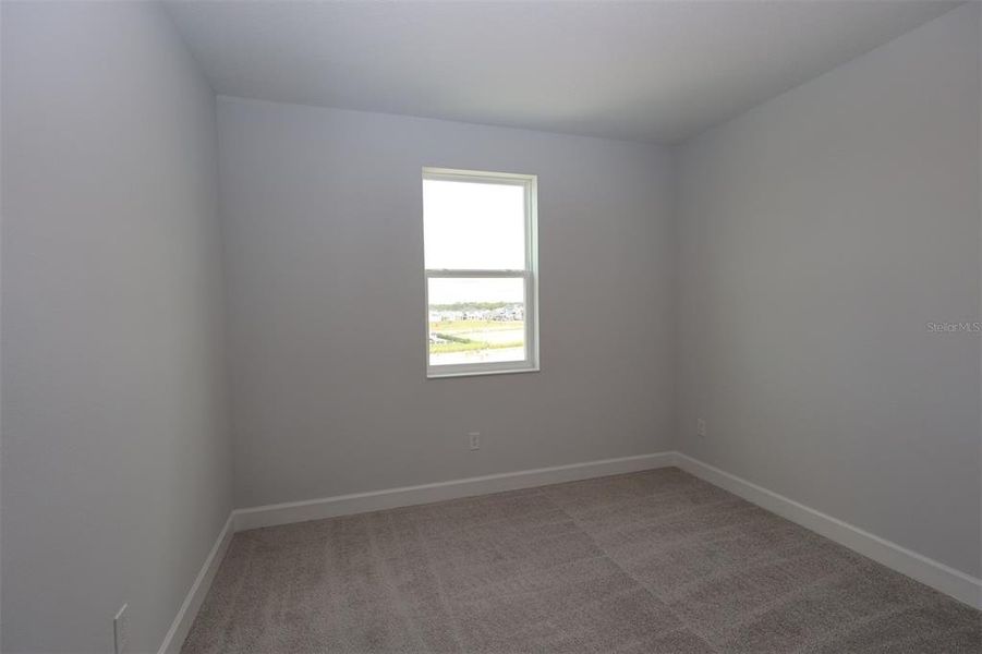 Spacious, unfurnished interior of a new home in Lake Star at Ovation, Winter Garden (Image 29).