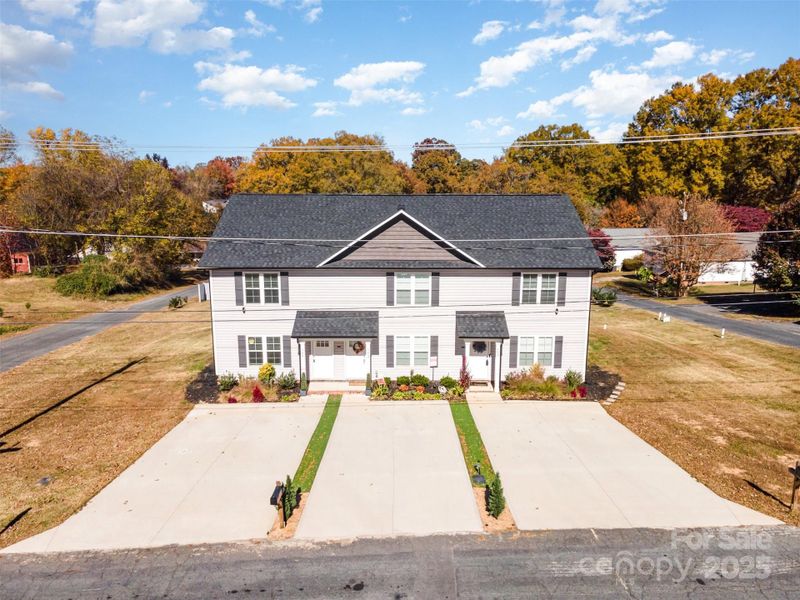 Front exterior of a new home in , Kannapolis, NC, highlighting curb appeal (Image 17).