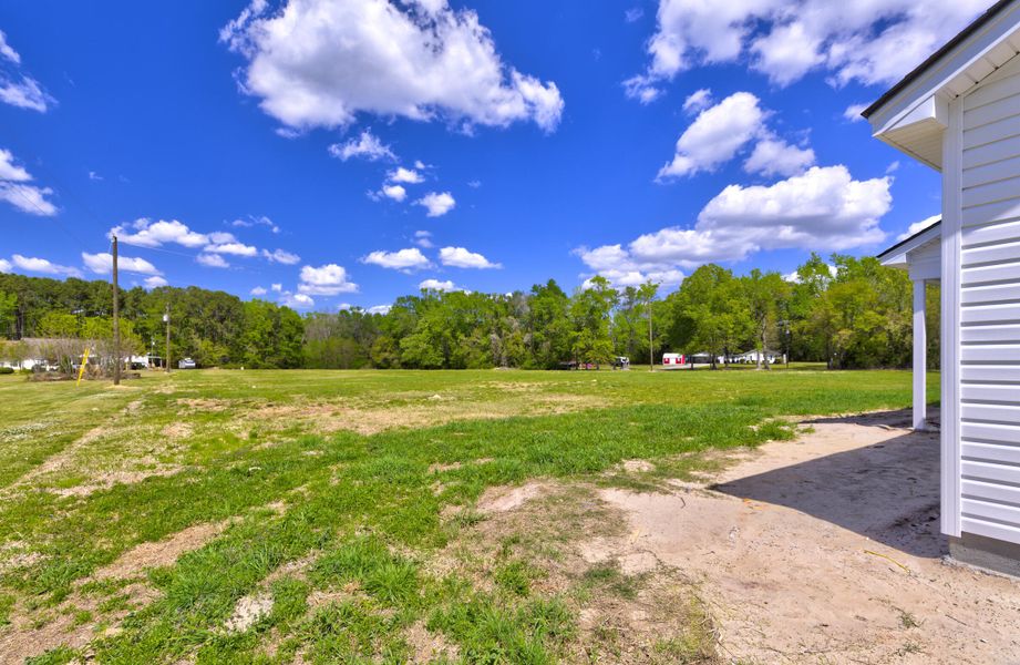Exterior details and patio area of a home in , Summerville (Image 15). Exterior details and patio area of a home in , Summerville (Image 15).