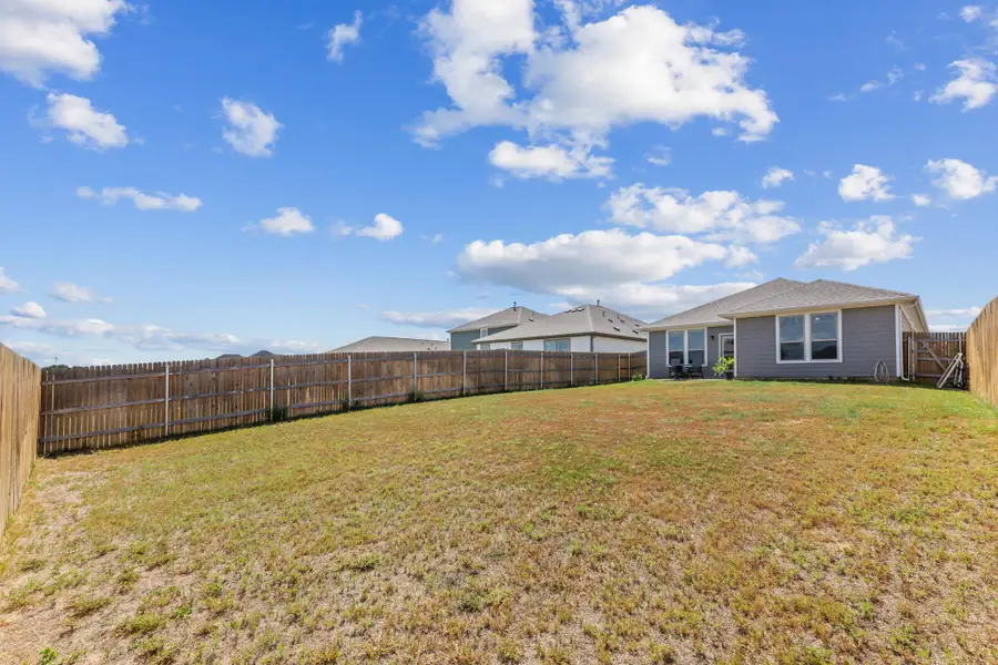 Exterior details and patio area of a home in The Ridge at Trinity Ranch, Elgin (Image 4). Exterior details and patio area of a home in The Ridge at Trinity Ranch, Elgin (Image 4).
