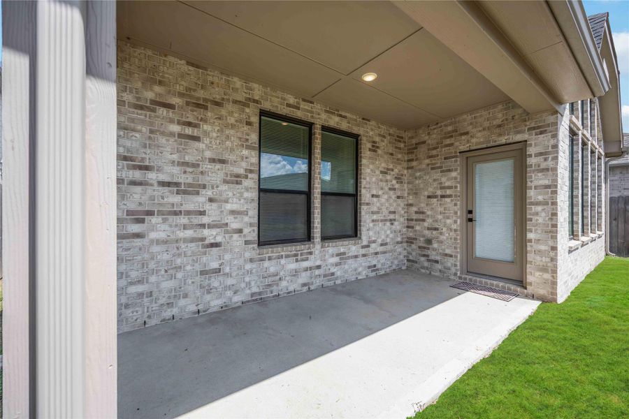 Exterior details and patio area of a home in Elyson 45' & 70', Katy (Image 23).