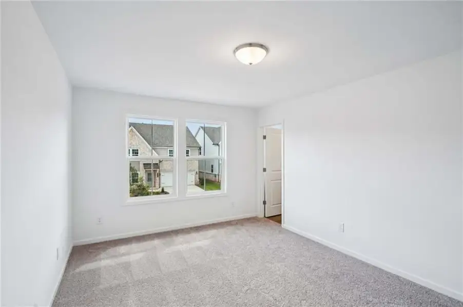 Spacious, unfurnished interior of a new home in Eastlyn Crossing, Flowery Branch (Image 27). Spacious, unfurnished interior of a new home in Eastlyn Crossing, Flowery Branch (Image 27).