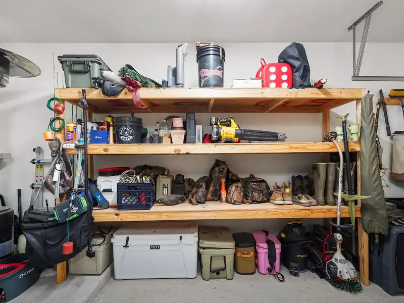 GARAGE STORAGE SHELVES ARE INCLUDED.