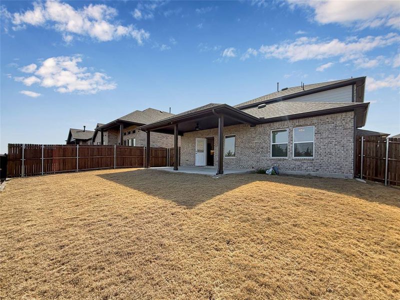 Exterior details and patio area of a home in Travis Ranch, Forney (Image 4).