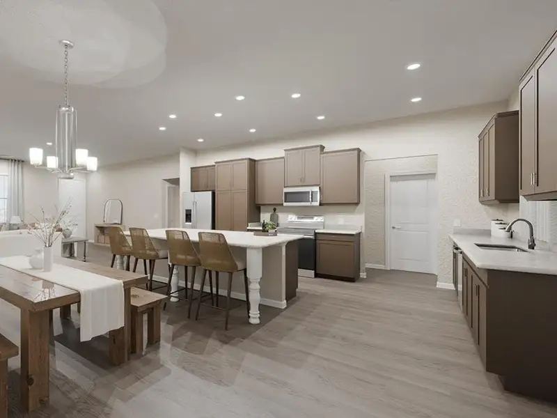Your new kitchen includes a counter-height island, a hidden pantry, and beautiful finishes. (Artist`s rendering)