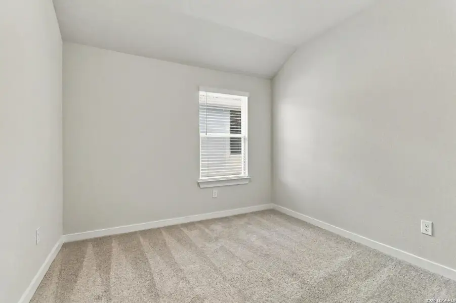 Spacious, unfurnished interior of a new home in Hunters Ranch, San Antonio (Image 23).
