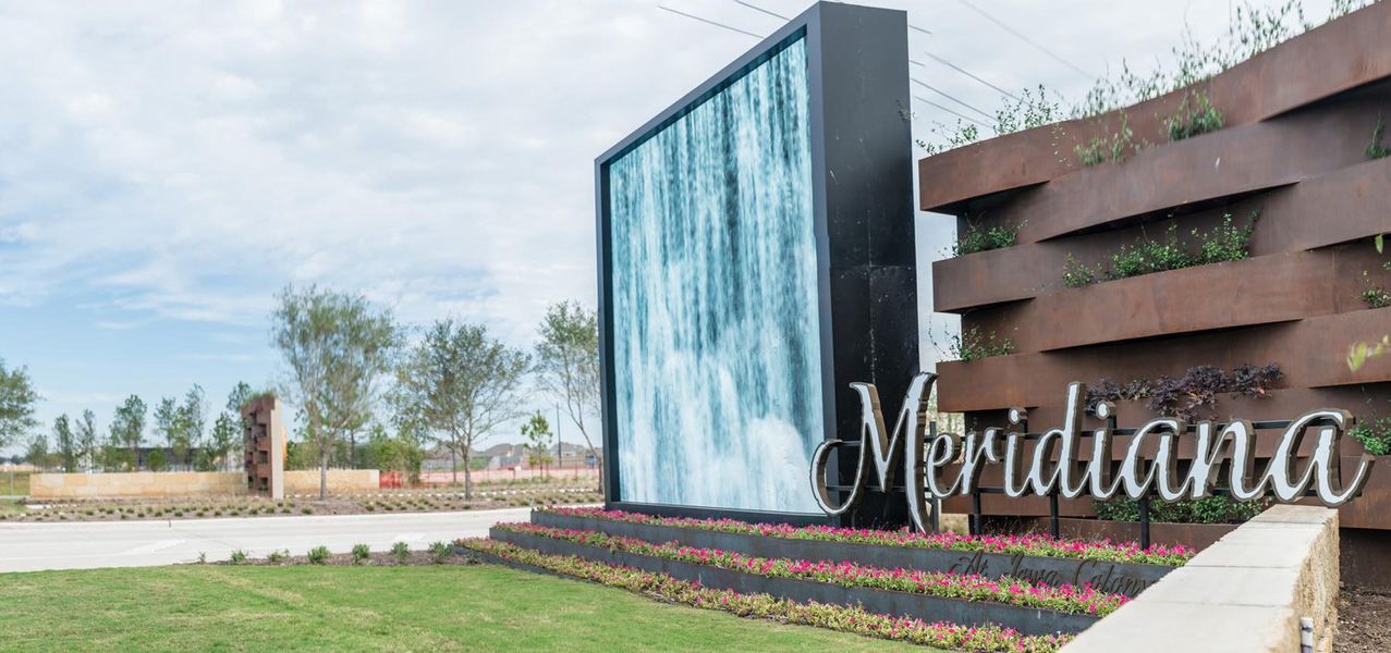 Front exterior of a new home in Meridiana: 50ft. lots, Manvel, TX, highlighting curb appeal (Image 2). Front exterior of a new home in Meridiana: 50ft. lots, Manvel, TX, highlighting curb appeal (Image 2).