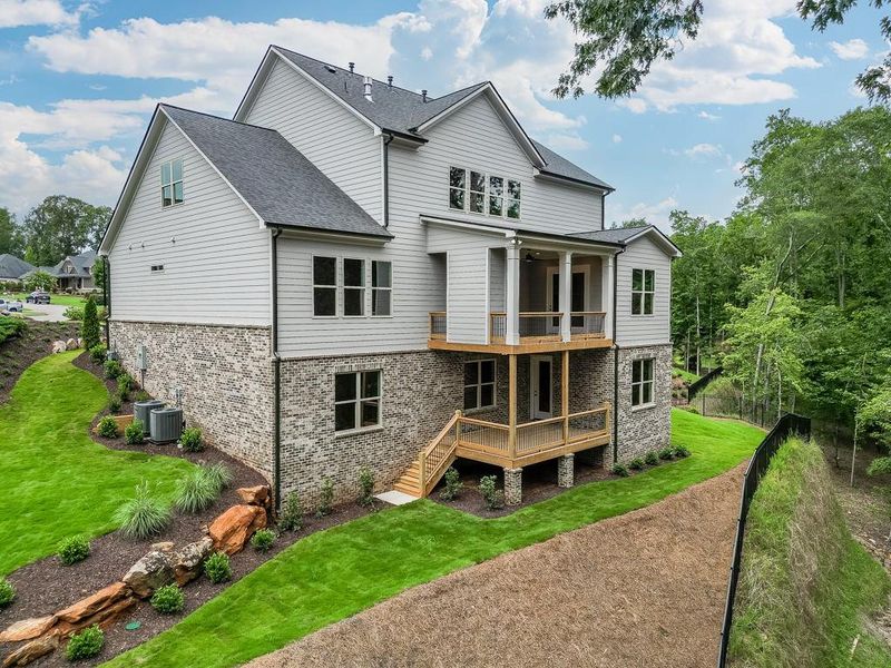 Front exterior of a new home in , Cumming, GA, highlighting curb appeal (Image 27).