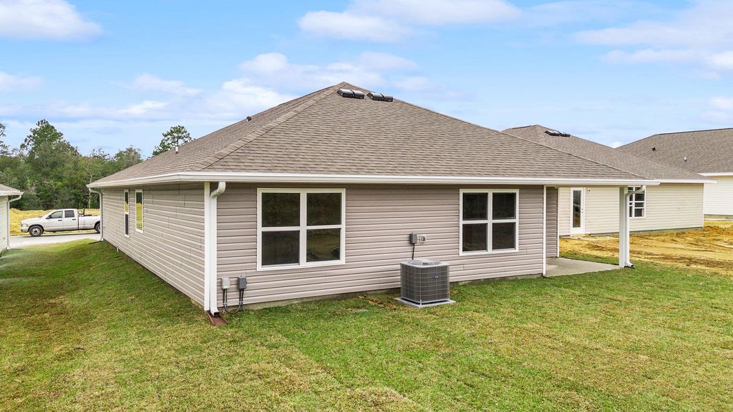 Exterior details and patio area of a home in Magnolia at the Bluffs Phase 3, Freeport (Image 3).