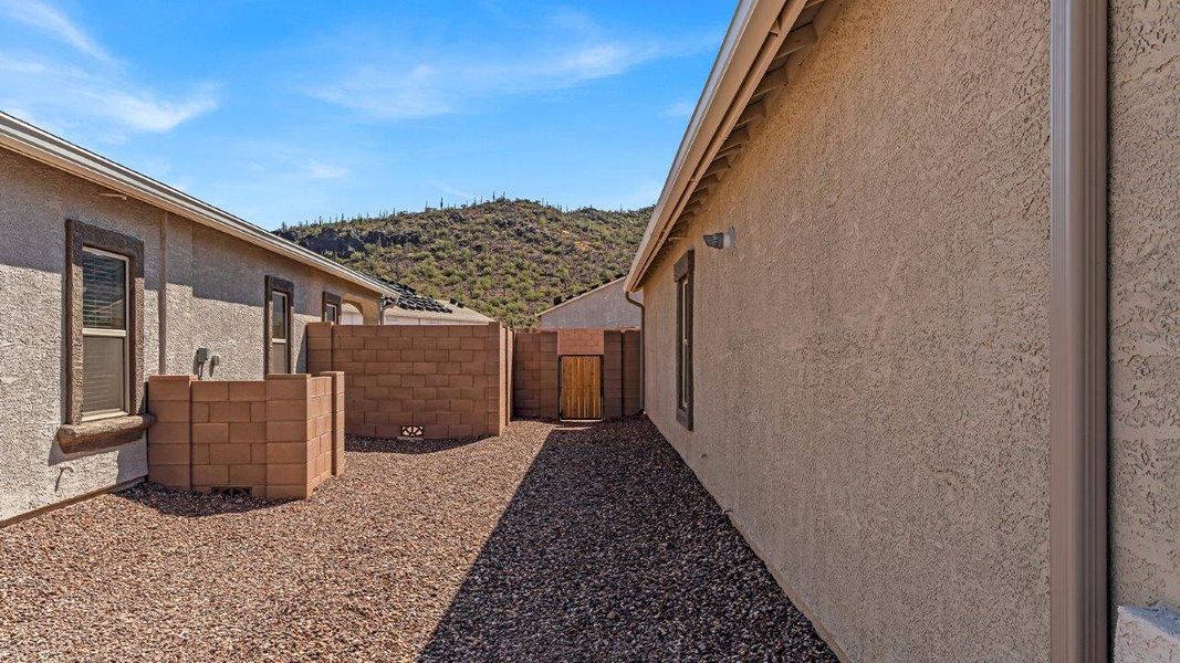 Representative exterior details of a home built from the Cali - Plan H40I by D.R. Horton in Tortolita Trails, Marana (Image 29).