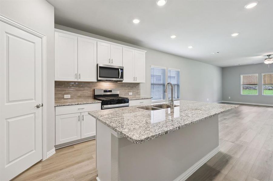 Furnished interior view inside a new home in Westmoor, Sherman (Image 8).