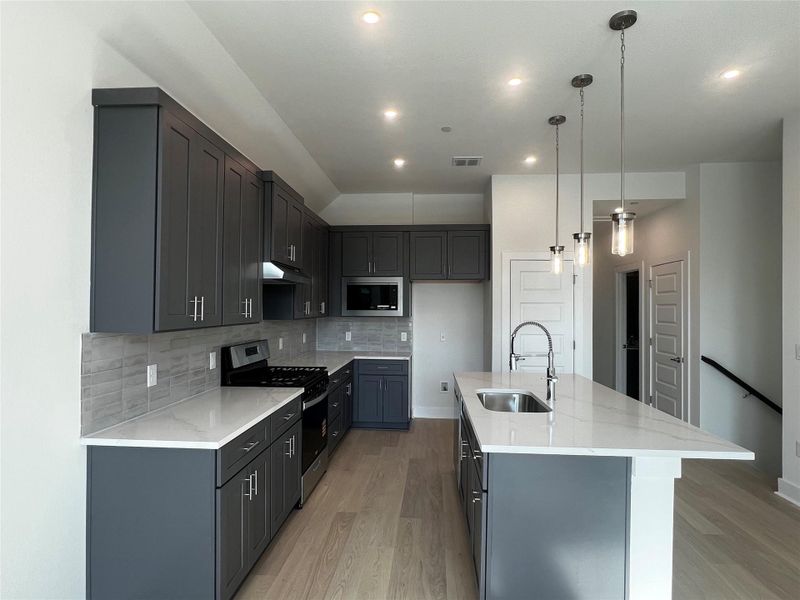 Furnished interior view inside a new home in Koenig Townhomes, Austin (Image 4).