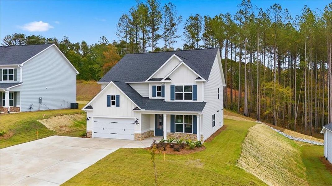 Front exterior of a new home in , Dallas, GA, highlighting curb appeal (Image 26). Front exterior of a new home in , Dallas, GA, highlighting curb appeal (Image 26).
