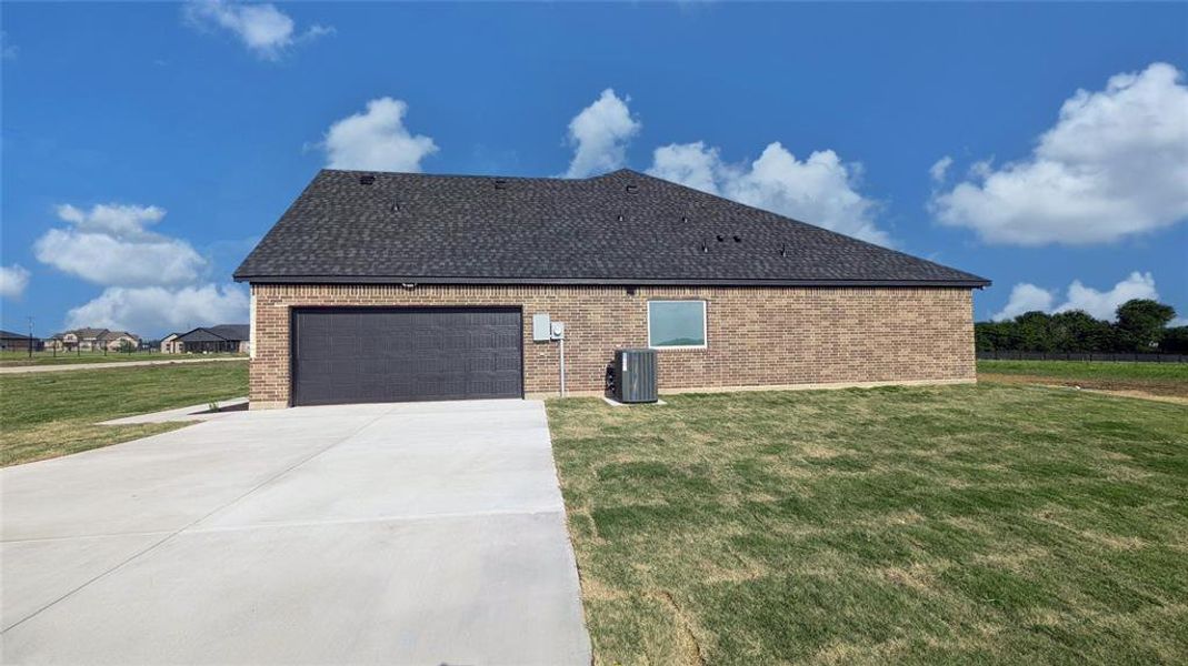 Front exterior of a new home in , Greenville, TX, highlighting curb appeal (Image 24).
