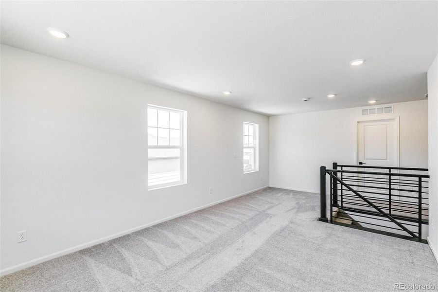 Spacious, unfurnished interior of a new home in Terrain Oak Valley, Castle Rock (Image 30).