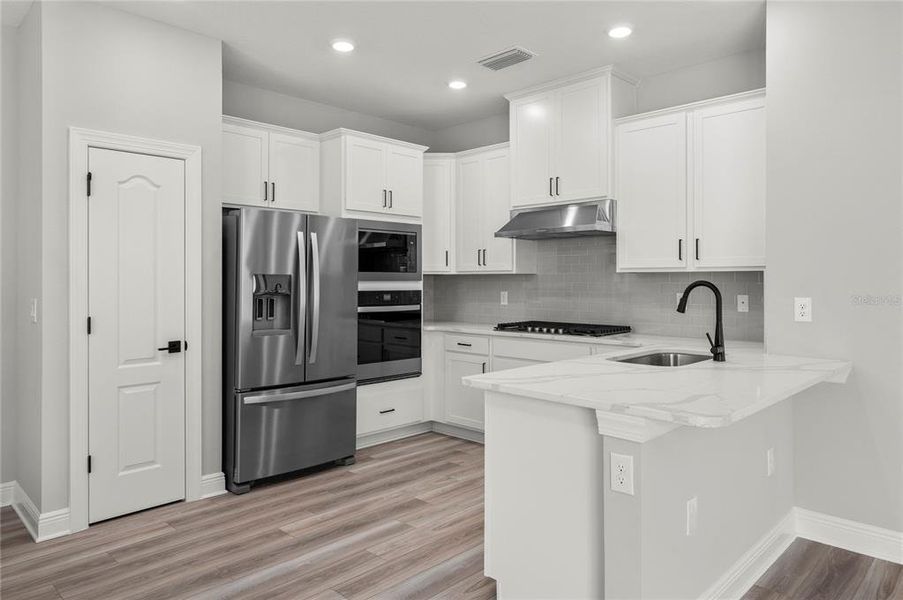 Furnished interior view inside a new home in Reunion Village, Kissimmee (Image 2). Furnished interior view inside a new home in Reunion Village, Kissimmee (Image 2).