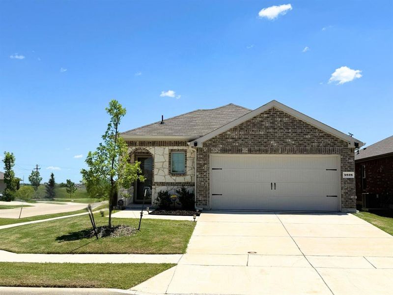 Front exterior of a new home in , Crandall, TX, highlighting curb appeal (Image 22).