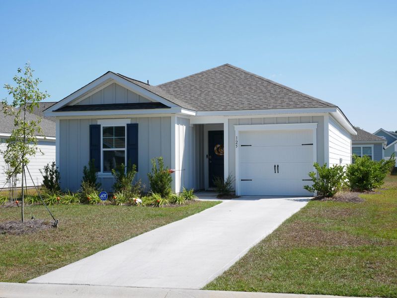 Front exterior of a new home in Center Pointe, Santee, SC, highlighting curb appeal (Image 1). Front exterior of a new home in Center Pointe, Santee, SC, highlighting curb appeal (Image 1).