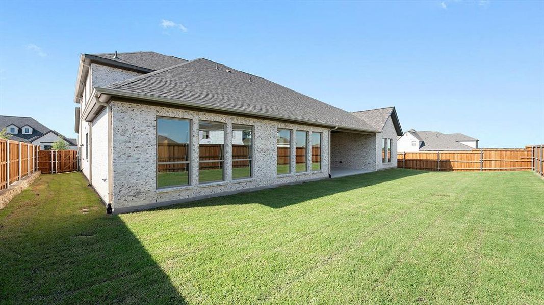 Front exterior of a new home in Terraces 72', Rockwall, TX, highlighting curb appeal (Image 2).