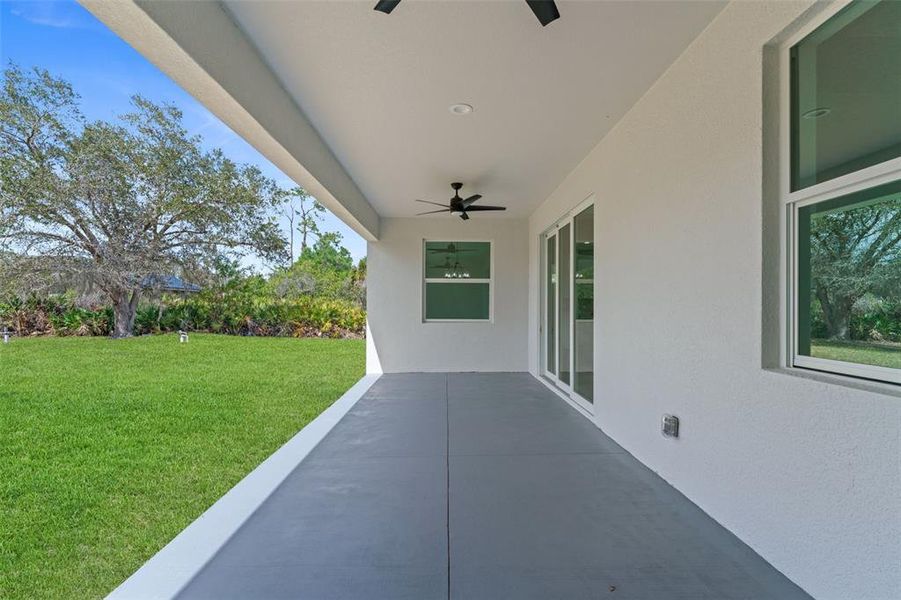 Exterior details and patio area of a home in , North Port (Image 19).