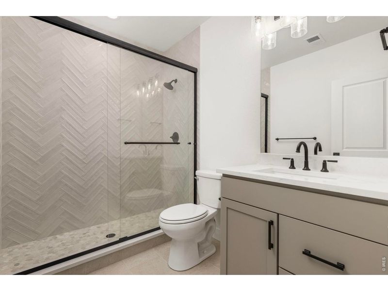 Furnished interior view inside a new home in RainDance, Windsor (Image 6).