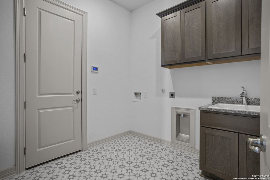 Furnished interior view inside a new home in Highland Estates, San Antonio (Image 9).