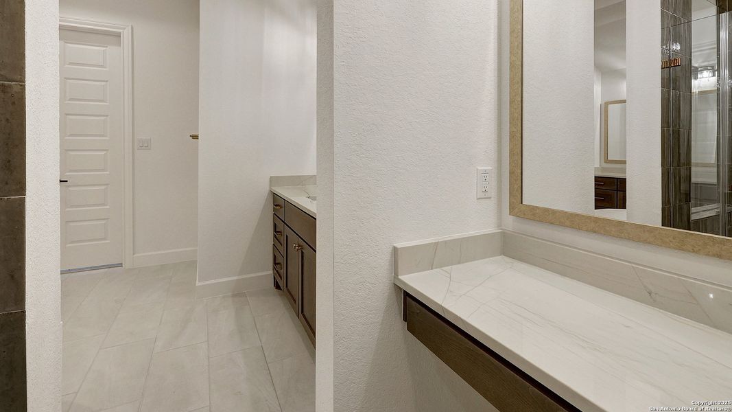 Furnished interior view inside a new home in The Dominion 70', San Antonio (Image 13).