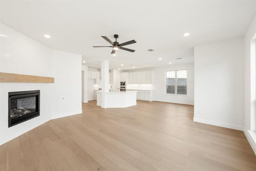 Spacious, unfurnished interior of a new home in Painted Tree Woodland District 50, McKinney (Image 26).